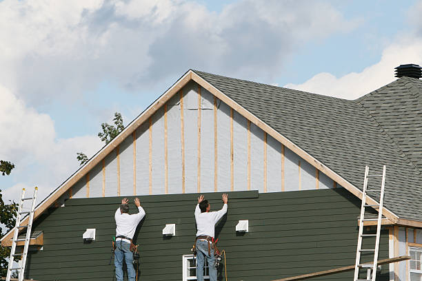 Professional Siding Repair technician working in Bergholz, OH